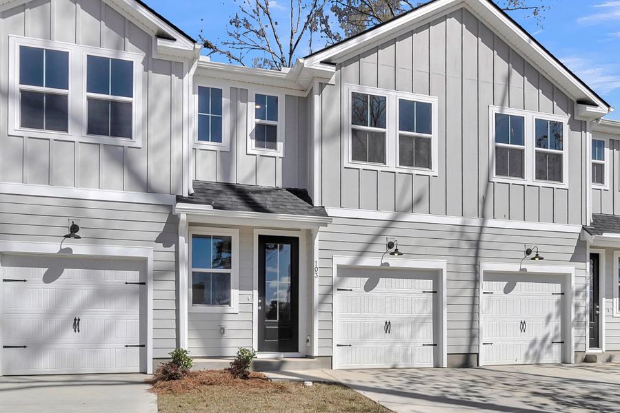 Front exterior of a new home in Windward Village, Summerville, SC, highlighting curb appeal (Image 15). Front exterior of a new home in Windward Village, Summerville, SC, highlighting curb appeal (Image 15).