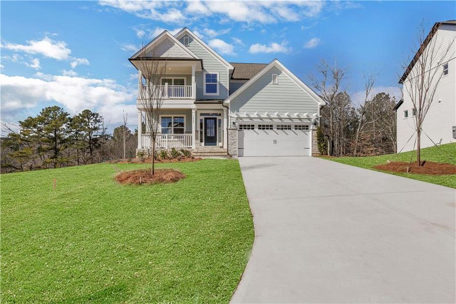 Front exterior of a new home in Cambridge, Flowery Branch, GA, highlighting curb appeal (Image 2).