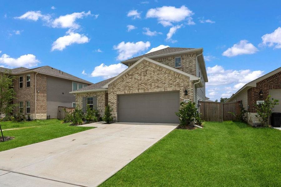 Front exterior of a new home in Sundance Cove - Classic Series, Crosby, TX, highlighting curb appeal (Image 22).
