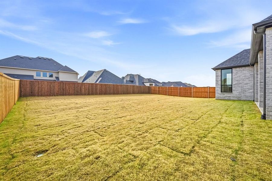 Exterior details and patio area of a home in Sandbrock Ranch, Aubrey (Image 17).