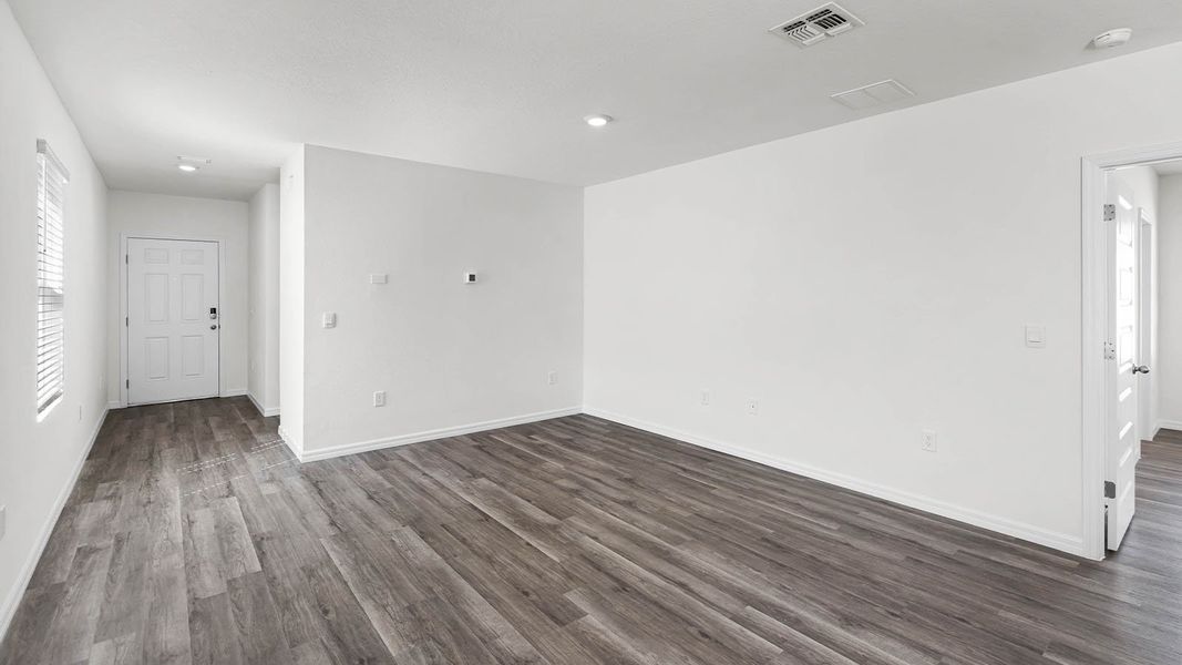 Representative unfurnished interior of a home built from the ASTOR by D.R. Horton in Harmony at Lake Eloise, Winter Haven (Image 11).