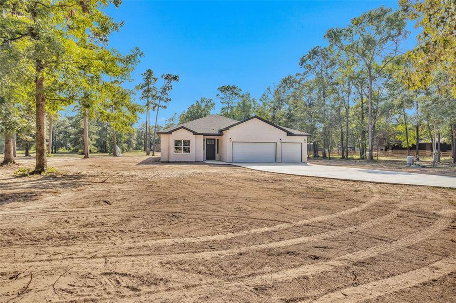 Gorgeous New Construction with Tons of Upgrades, Grand Entry, Open Concept Main Living Area, 3 Bedroom, 3 Bath, 3 car garage sitting on 1.5 acres. Landscape package to be completed prior to closing to include Front flower bed, Grass to end of driveway in the front, 8 feet of grass on each side, 30 feet of grass in the back yard and a sprinkler system for all landscaped areas.