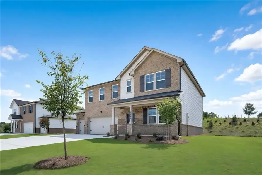 Front exterior of a new home in Apalachee Hills, Bethlehem, GA, highlighting curb appeal (Image 2).