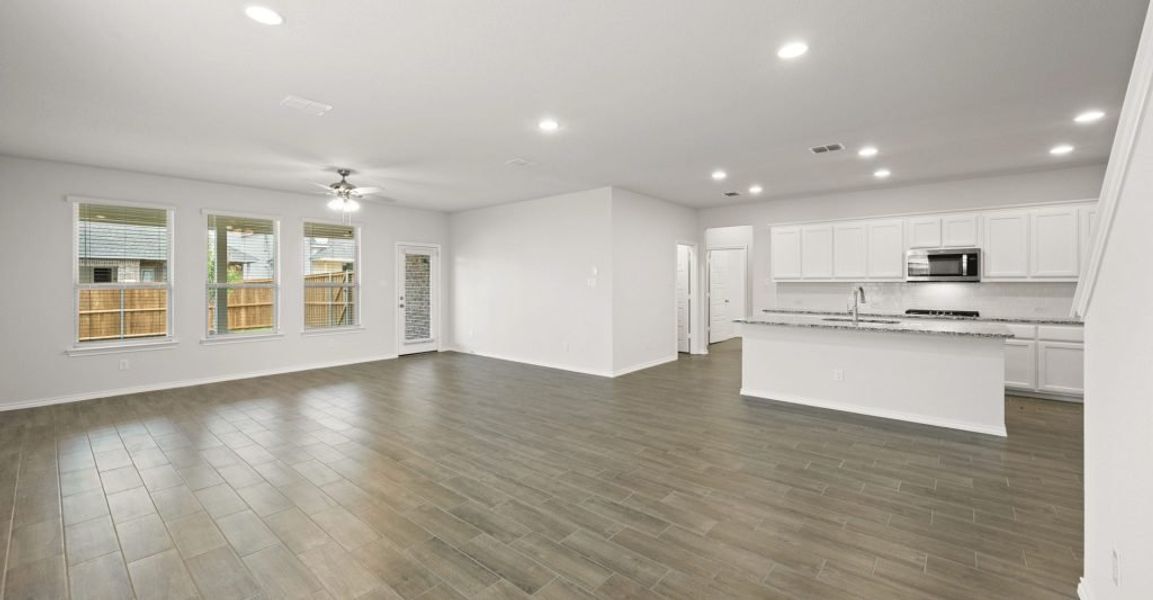 Representative exterior photo of a completed home built from the Oliver by Impression Homes in Redden Farms, Midlothian, TX (Image 13). Representative exterior photo of a completed home built from the Oliver by Impression Homes in Redden Farms, Midlothian, TX (Image 13).