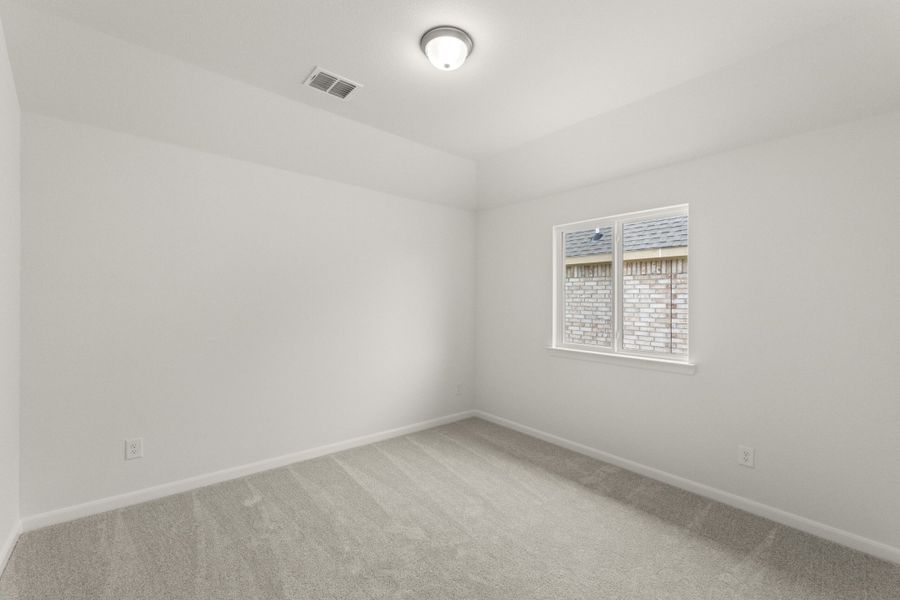 Spacious, unfurnished interior of a new home in The Reserve at Spiritas Ranch, Little Elm (Image 30).
