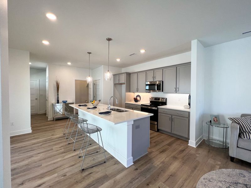 Representative furnished interior of a home built from the Cypress by Perfection Builders in Heritage Commons, Andover (Image 4).