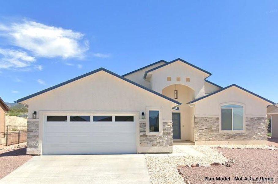 Front exterior of a new home in , Cañon City, CO, highlighting curb appeal (Image 2). Front exterior of a new home in , Cañon City, CO, highlighting curb appeal (Image 2).