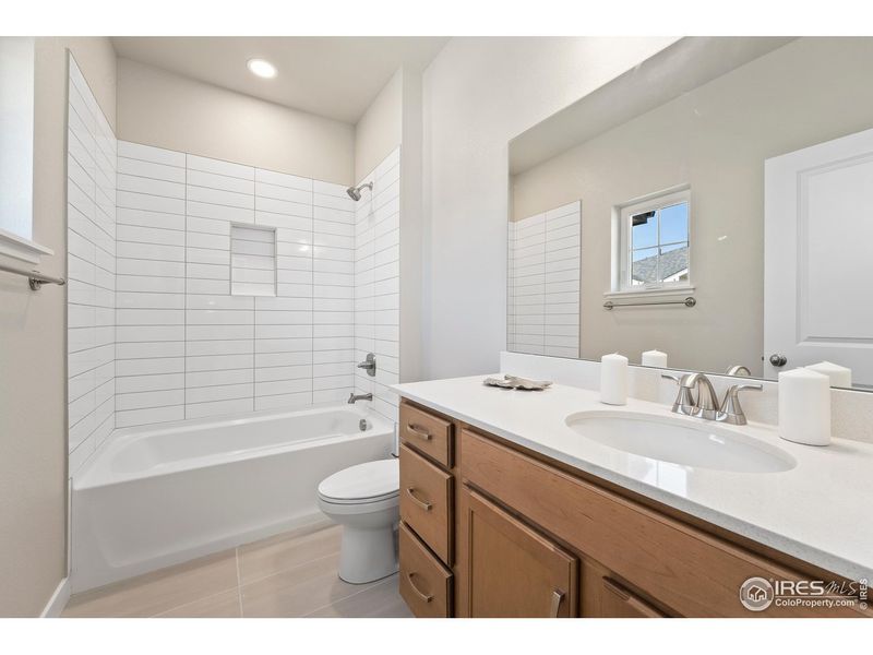 Furnished interior view inside a new home in The Lakes at Centerra - Discovery, Loveland (Image 14).