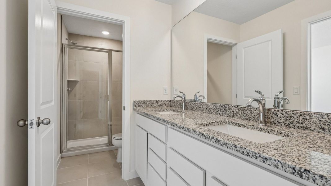Furnished interior view inside a new home in Cyrene at Harmony, St. Cloud (Image 32).