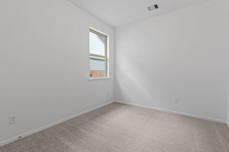 Your secondary bedroom features plush carpet, fresh paint, closet, and a large window that lets in plenty of natural lighting. Your secondary bedroom features plush carpet, fresh paint, closet, and a large window that lets in plenty of natural lighting.