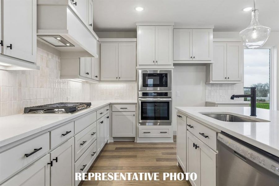 Beautiful cabinetry, gorgeous countertops and elegant backsplash effortlessly pair with contemporary stainless steel to create a classically styled dream kitchen! REPRESENTATIVE PHOTO Beautiful cabinetry, gorgeous countertops and elegant backsplash effortlessly pair with contemporary stainless steel to create a classically styled dream kitchen! REPRESENTATIVE PHOTO