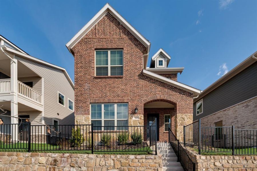 Front exterior of a new home in Bayside, Rowlett, TX, highlighting curb appeal (Image 18). Front exterior of a new home in Bayside, Rowlett, TX, highlighting curb appeal (Image 18).
