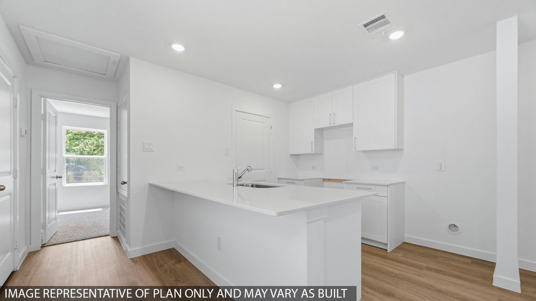 Furnished interior view inside a new home in Baron Village, Conroe (Image 7).