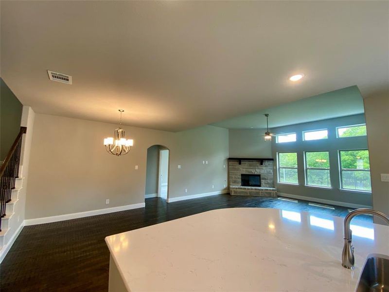 Rich Ebony scraped hardwoods in entry, dining, family, kitchen & cafe! Rich Ebony scraped hardwoods in entry, dining, family, kitchen & cafe!