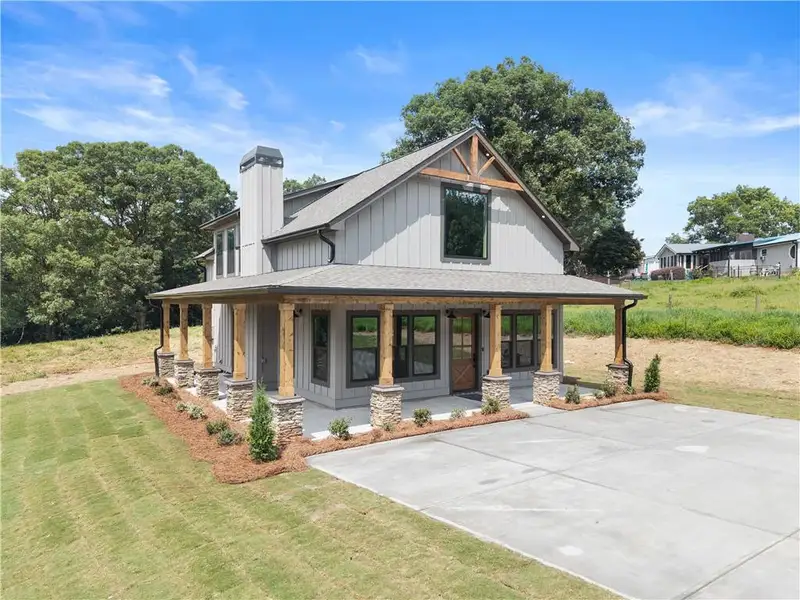 Front exterior of a new home in , Cleveland, GA, highlighting curb appeal (Image 28). Front exterior of a new home in , Cleveland, GA, highlighting curb appeal (Image 28).