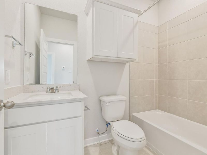 Furnished interior view inside a new home in Spring Branch Crossing, Conroe (Image 18).