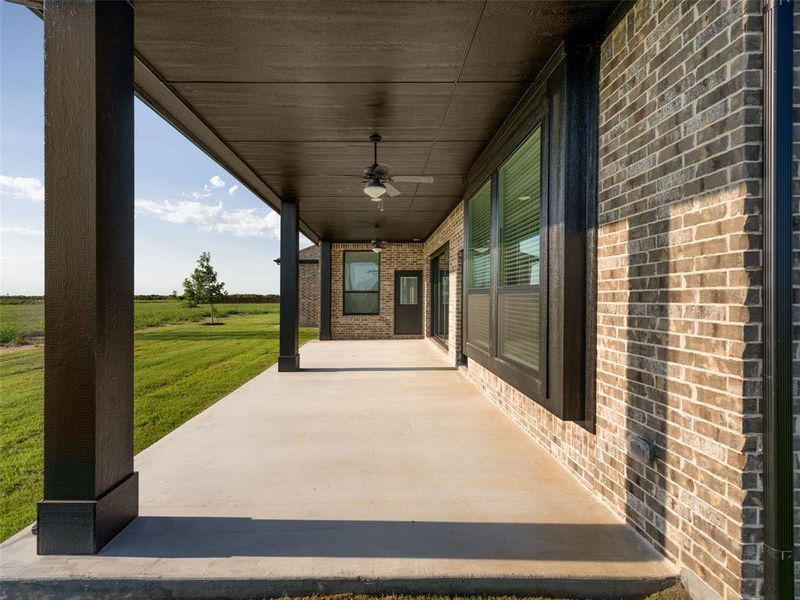 View of patio / terrace featuring ceiling fan