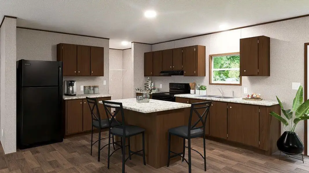Kitchen featuring wood-finish flooring, dark wood cabinetry, and light-toned countertops Kitchen featuring wood-finish flooring, dark wood cabinetry, and light-toned countertops