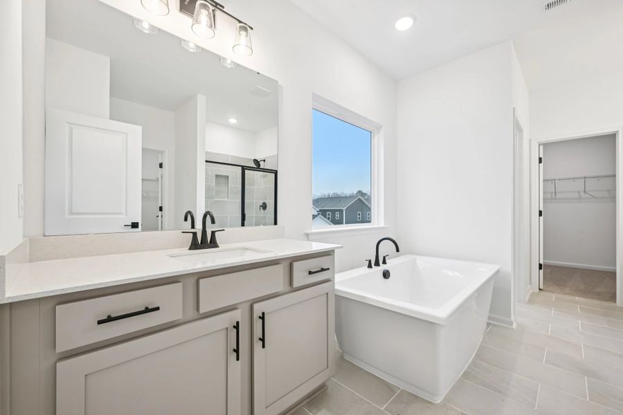 Primary Bath featuring the AW Collection® Foundry - Sleek finishes and dramatic contrasts shine.