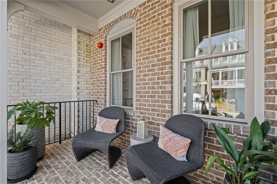 Exterior details and patio area of a home in South on Main, Woodstock (Image 4).