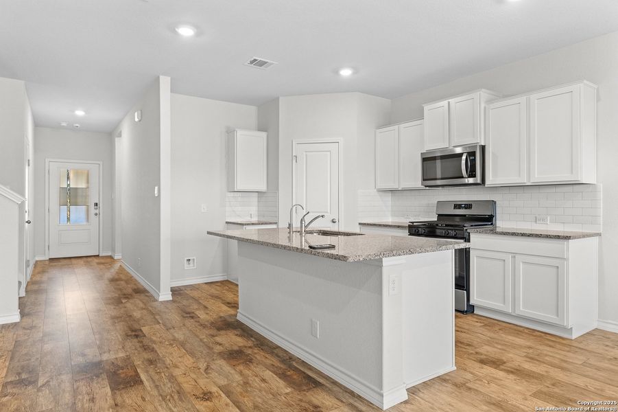 Furnished interior view inside a new home in Brookstone Creek, San Antonio (Image 9).
