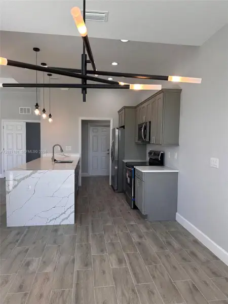 Furnished interior view inside a new home in , Cape Coral (Image 3).