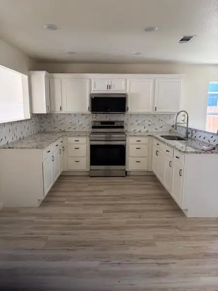 Furnished interior view inside a new home in , Itasca (Image 3).