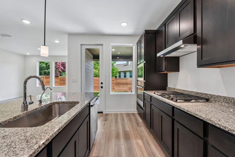 Furnished interior view inside a new home in Parkton Square, Kyle (Image 18).