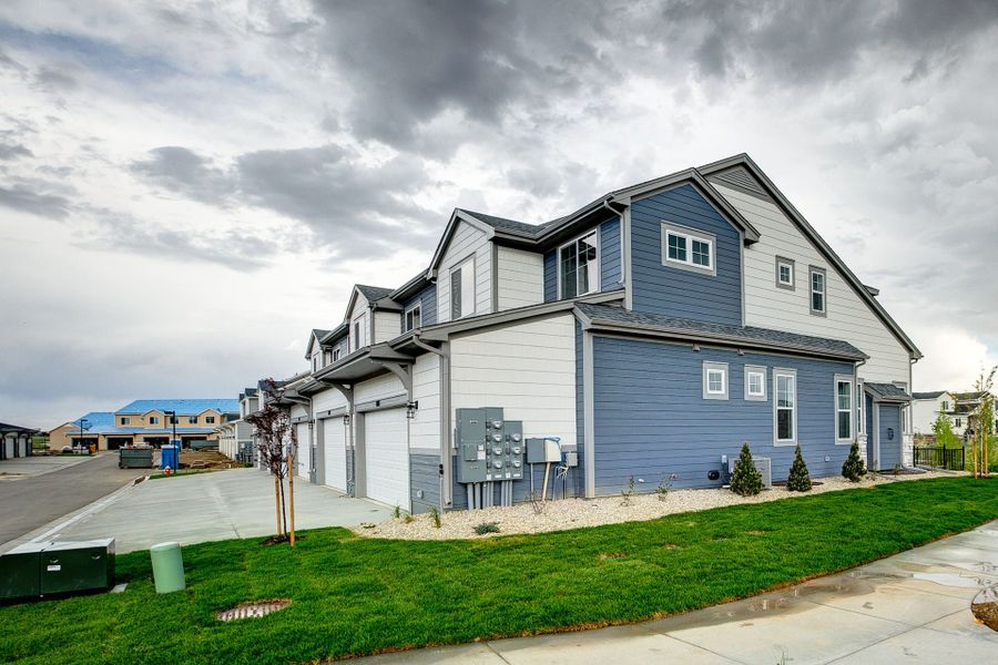 Representative exterior photo of a completed home built from the The Addison by Landmark Homes in The Lakes at Centerra, Loveland, CO (Image 2). Representative exterior photo of a completed home built from the The Addison by Landmark Homes in The Lakes at Centerra, Loveland, CO (Image 2).