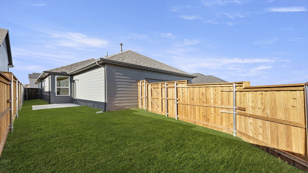 Exterior details and patio area of a home in Waterscape, Royse City (Image 4). Exterior details and patio area of a home in Waterscape, Royse City (Image 4).