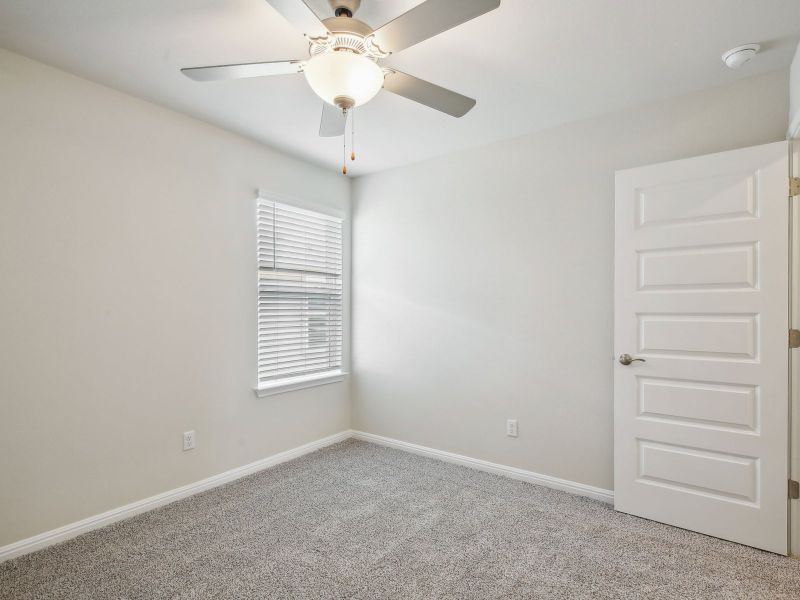 Spacious, unfurnished interior of a new home in Big Sky Ranch - Reserve Collection, Dripping Springs (Image 15).