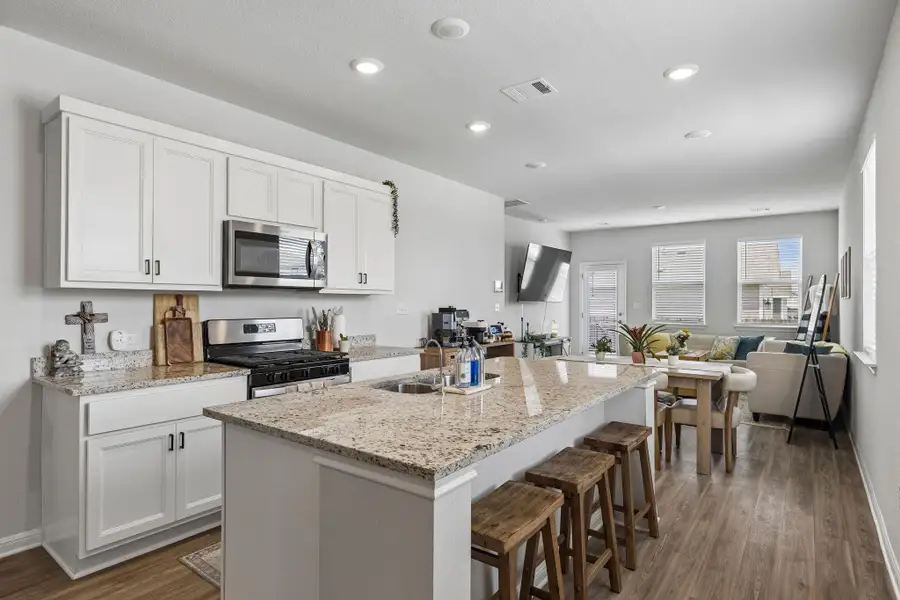 Furnished interior view inside a new home in Stallion Run, Buda (Image 4).