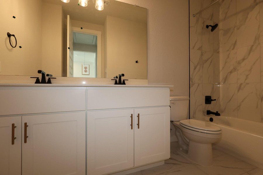 Furnished interior view inside a new home in Flora, Hutto (Image 16).