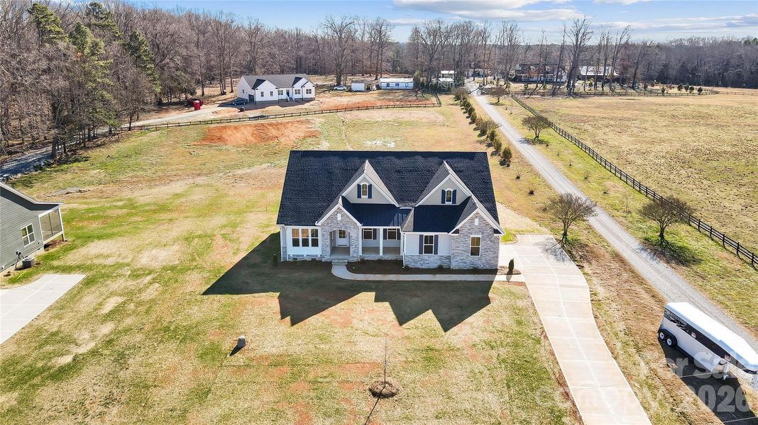Front exterior of a new home in Lancaster Hwy, Waxhaw, NC, highlighting curb appeal (Image 21).