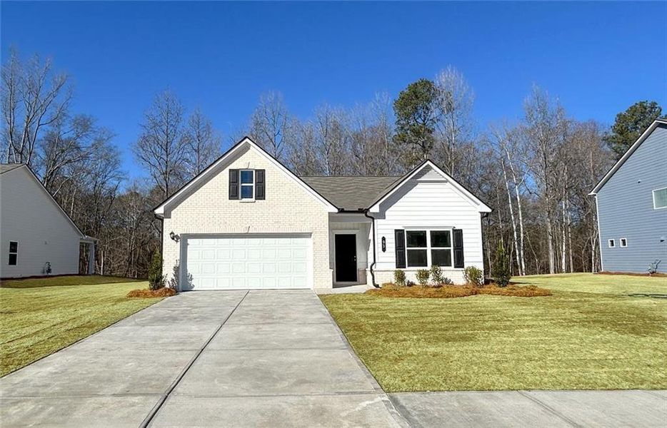 Front exterior of a new home in Jones Ridge, Dallas, GA, highlighting curb appeal (Image 1). Front exterior of a new home in Jones Ridge, Dallas, GA, highlighting curb appeal (Image 1).
