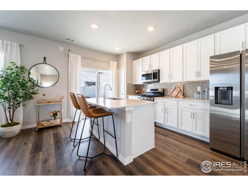 Stock Photos - home is complete! May contain additional upgrades. Come take a look! - Kitchen