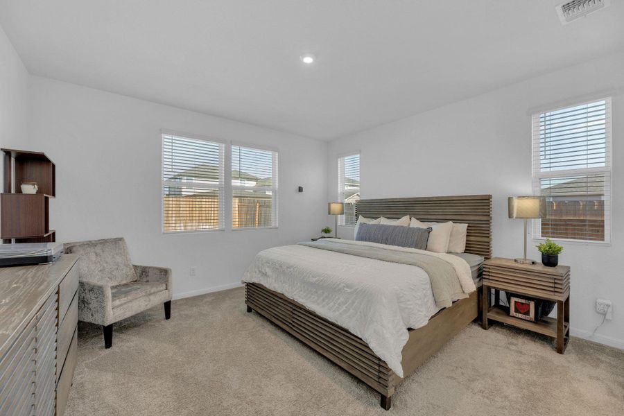 Furnished interior view inside a new home in Seasons at Carillon, Manor (Image 5).