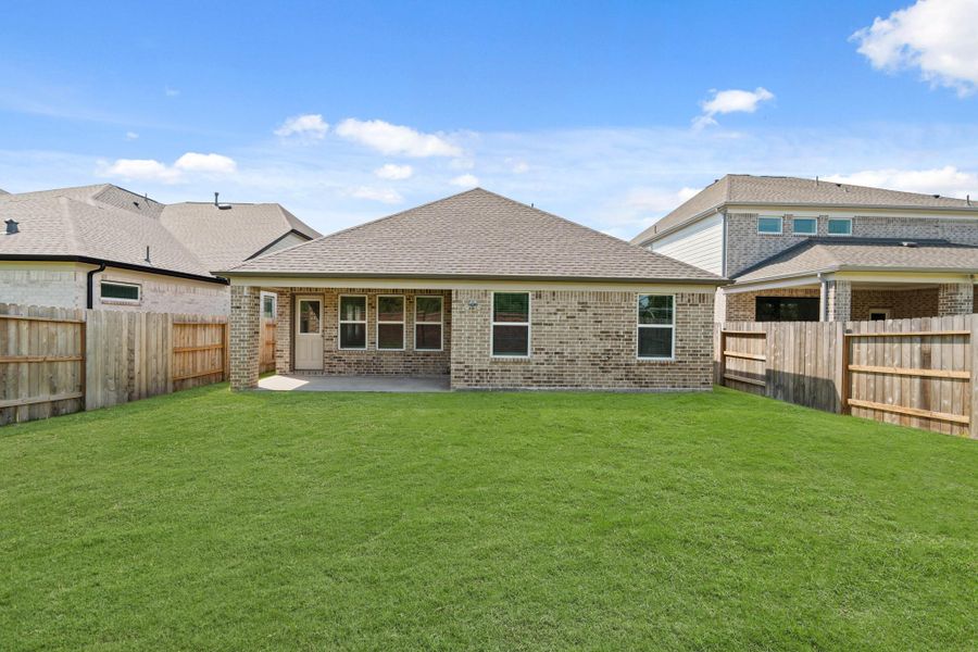 Exterior details and patio area of a home in Sunterra North, Katy (Image 3). Exterior details and patio area of a home in Sunterra North, Katy (Image 3).