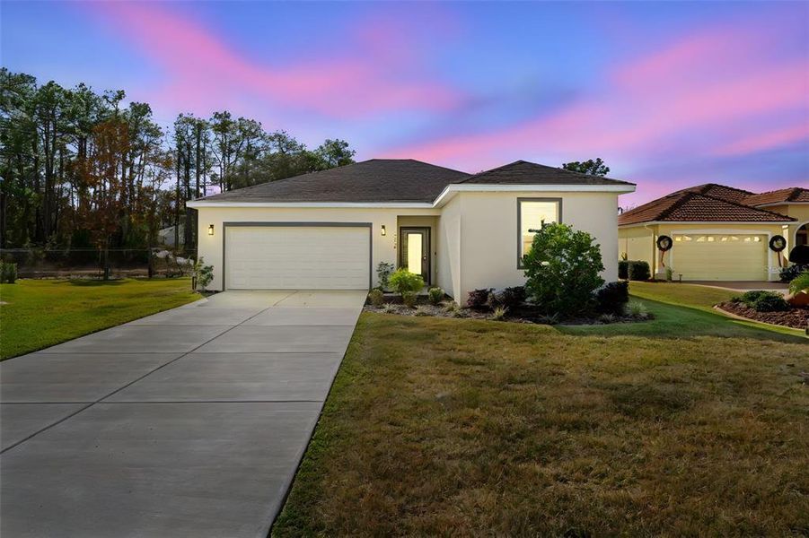 Front exterior of a new home in , Weeki Wachee, FL, highlighting curb appeal (Image 27).