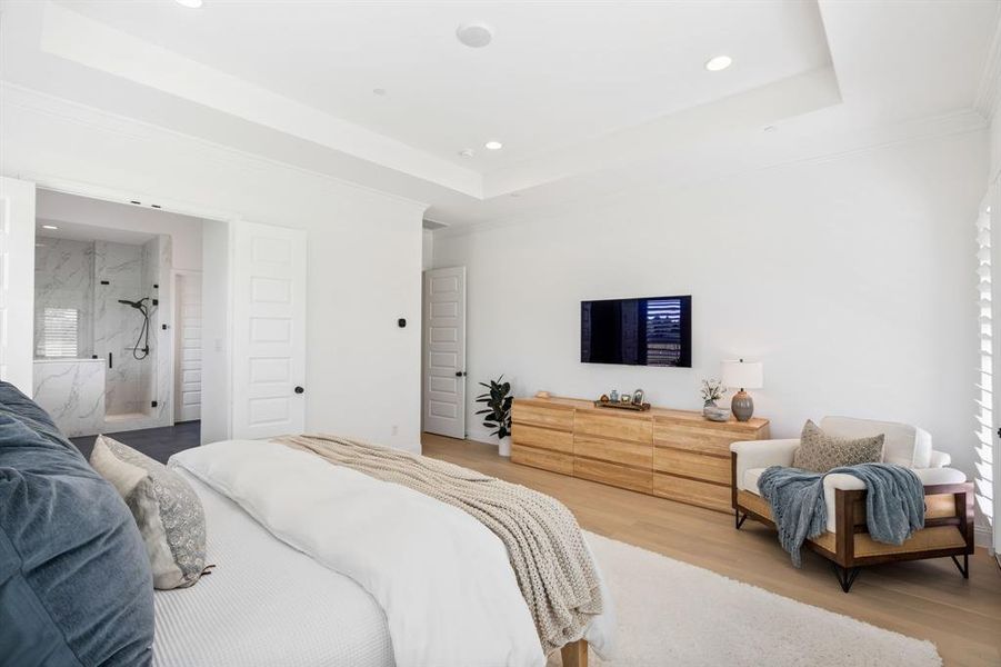 Double doors leading into the primary bath.