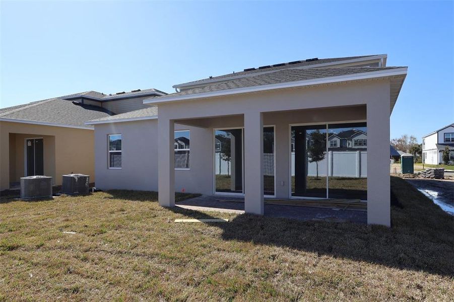 Exterior details and patio area of a home in Estates at Rivercrest, Sanford (Image 3).