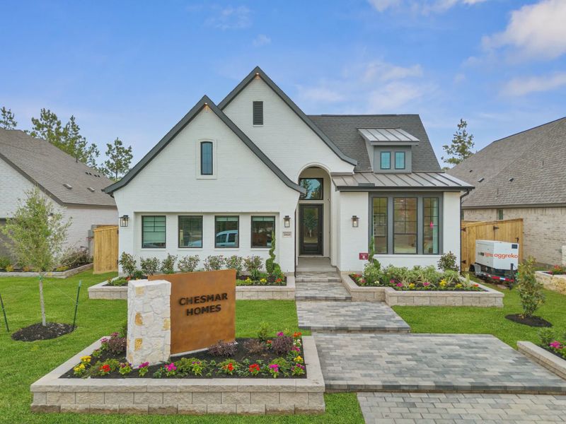 Front exterior of a new home in Kresston, Montgomery, TX, highlighting curb appeal (Image 4). Front exterior of a new home in Kresston, Montgomery, TX, highlighting curb appeal (Image 4).