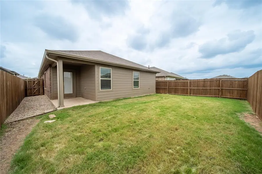 Exterior details and patio area of a home in , Crandall (Image 3).