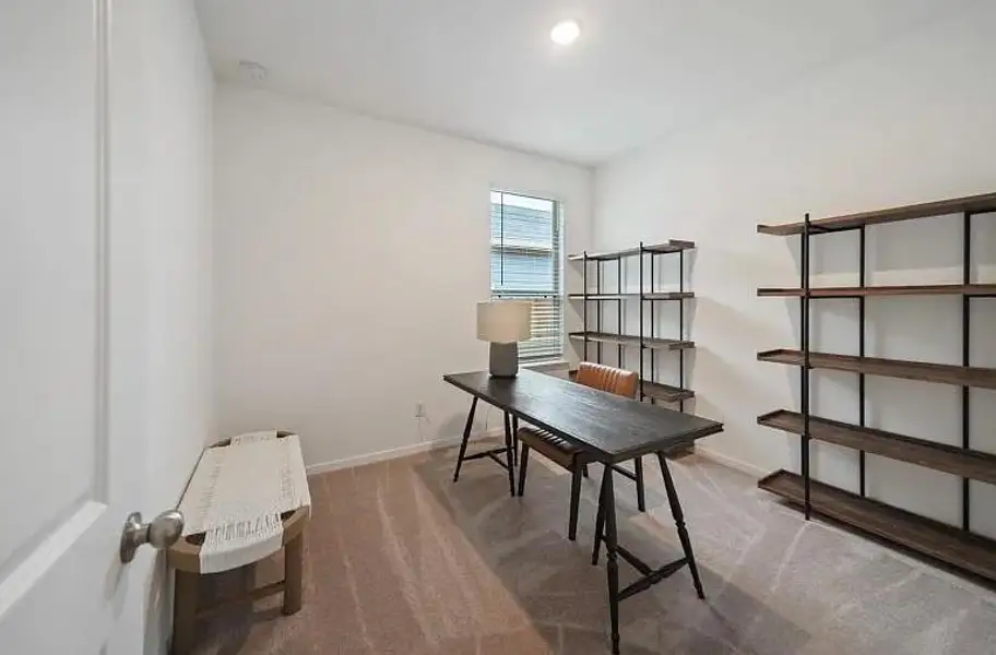 Furnished interior view inside a new home in The Pines At Seven Coves, Conroe (Image 2).