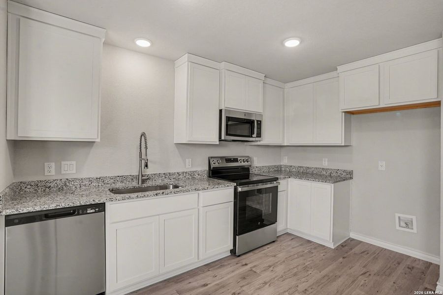 Furnished interior view inside a new home in , San Antonio (Image 9).