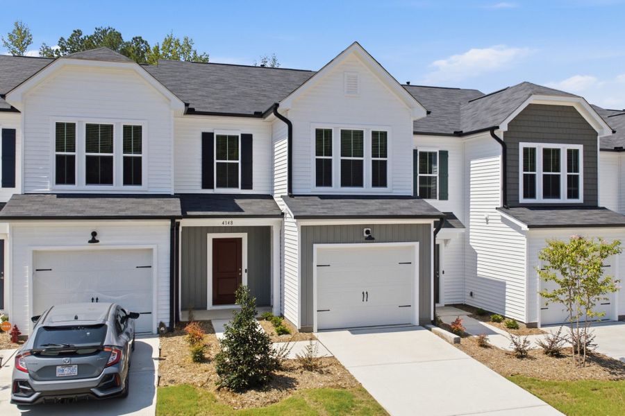 Front exterior of a new home in Carpenter Falls, Durham, NC, highlighting curb appeal (Image 32).