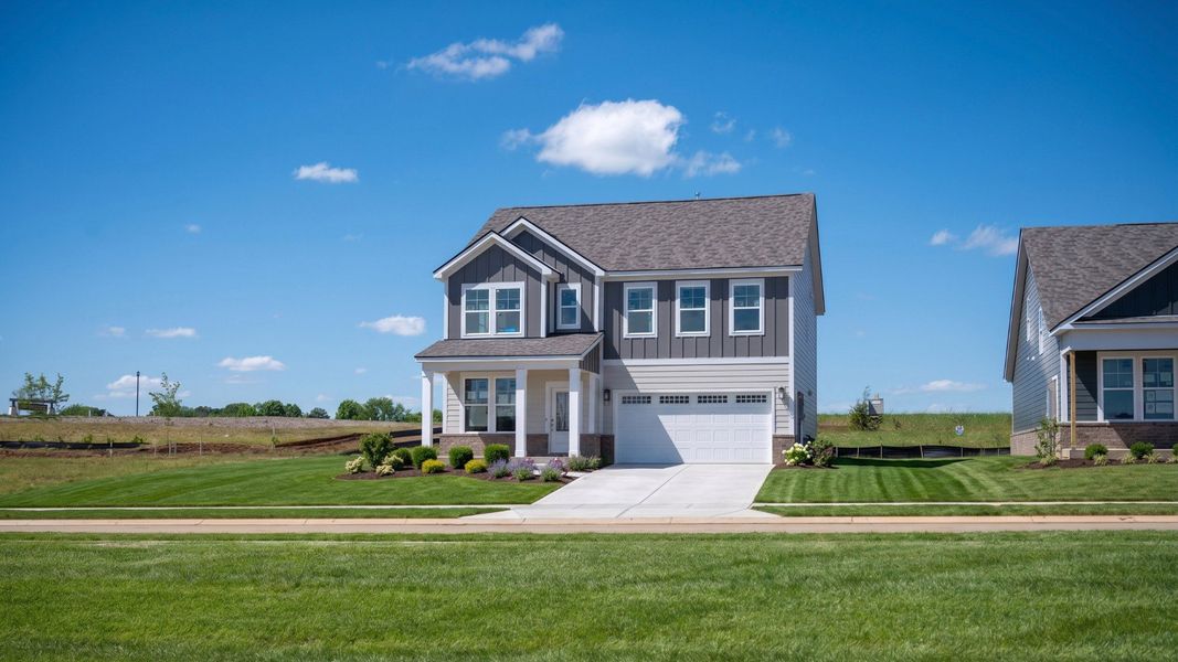 Front exterior with 2-car garage