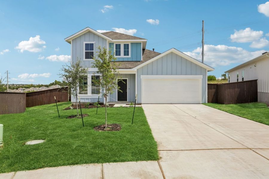 Front exterior of a new home in Cloverleaf, Austin, TX, highlighting curb appeal (Image 18).