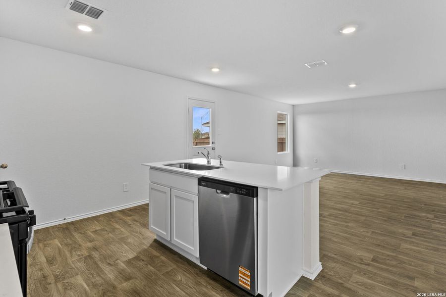 Furnished interior view inside a new home in Avenida, Converse (Image 5).