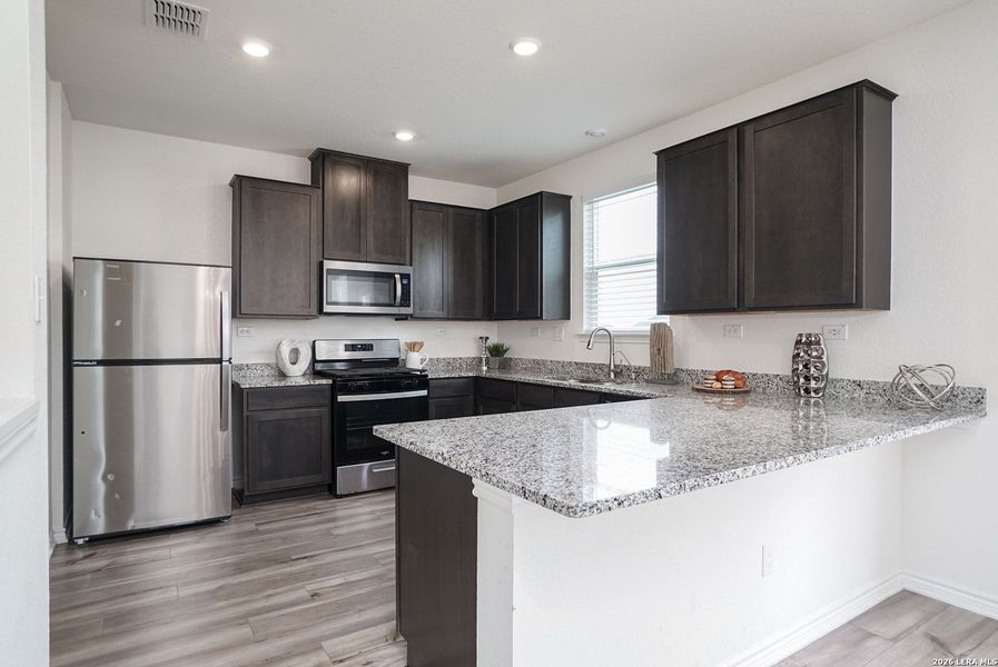 Furnished interior view inside a new home in Parklands, Schertz (Image 10).
